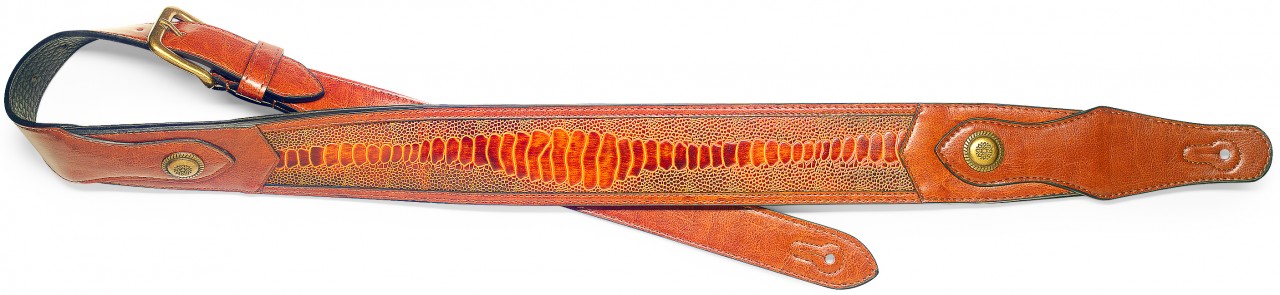 Light brown padded leatherette guitar strap with pressed snake skin pattern